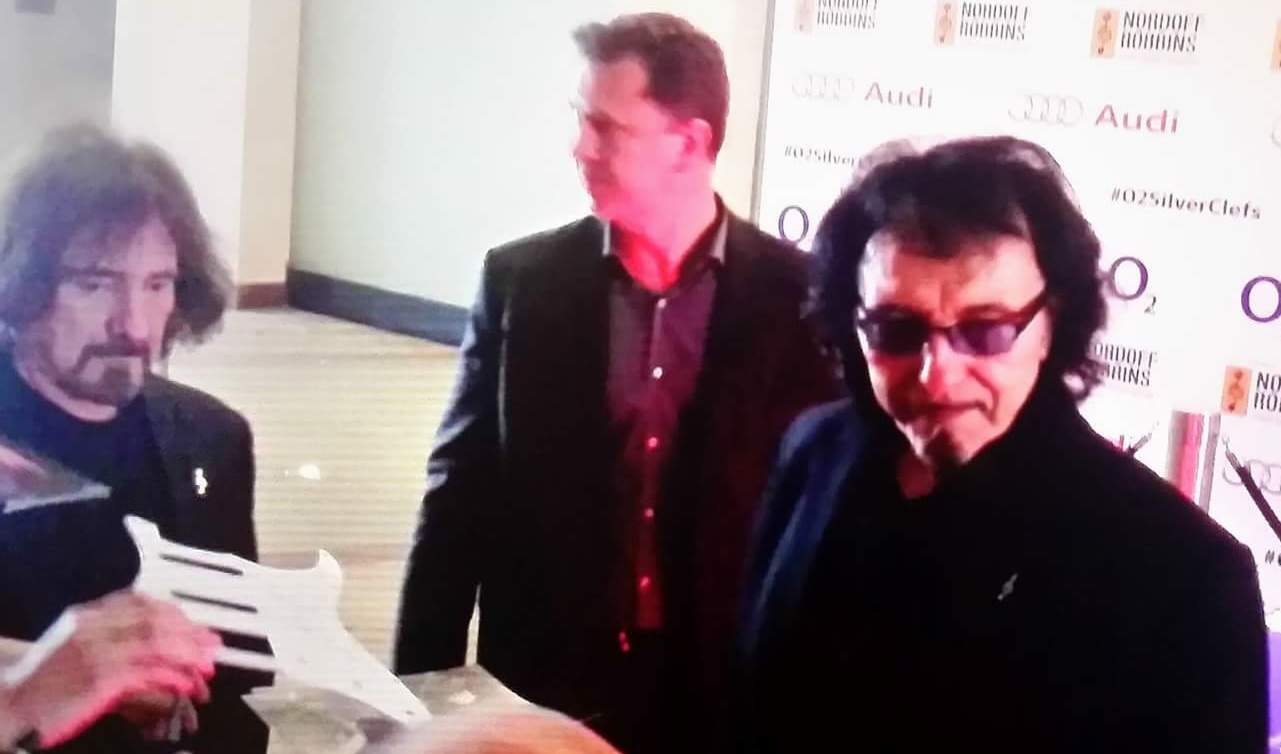 Tony and Geezer signing for fans in a Hilton Hotel hall, during 